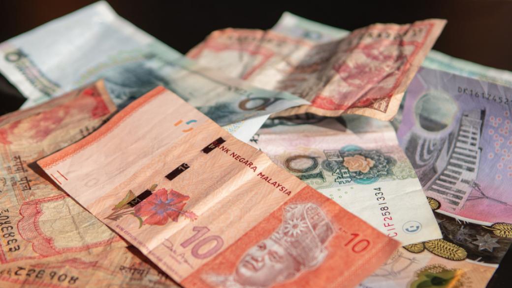 Китай може би опитва да спре обезценяването на юана