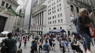 Въпреки редица слаби отчети Уолстрийт финишира на зелено