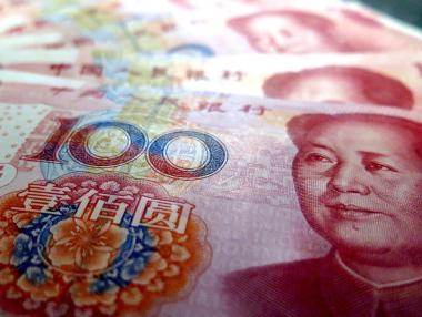 За месец дигиталният юан участва в трансфери за милиони