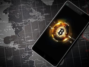 Биткойн докосна рекордните 50 000 долара