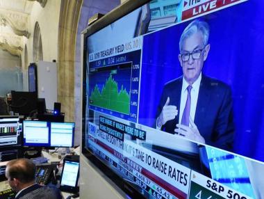 Федералният резерв леко забавя печатницата за пари