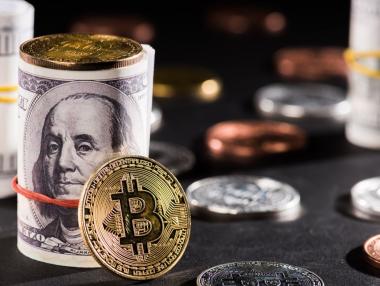 Биткойнът достигна 50 000 долара