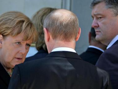 Ангела Меркел обеща ЕС да свали санкциите при мир в Донбас