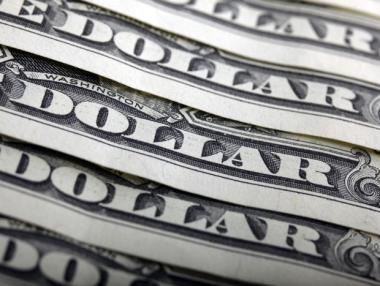 Доларът нараства срещу йената при покриване на къси позиции