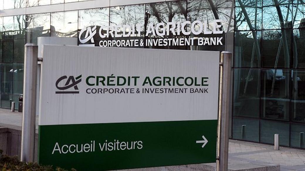 Crédit Agricole глобена с 900 млн. долара