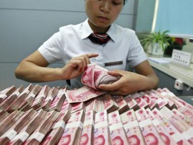 Китай обеща реформи след превръщането на юана в световна резервна валута