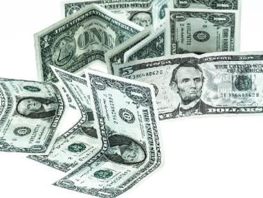 Доларът възстанови част от загубите след коментарите на Фед