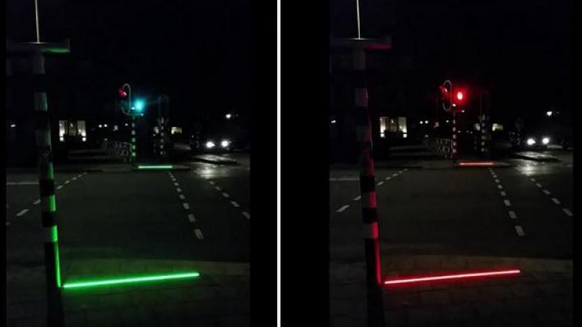 Холандски град направи светофари на асфалта за смартфон-любители
