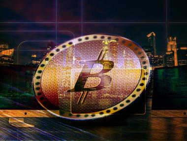 Bitcoin поевтиня след старта на фючърсите на най-голямата борса CME