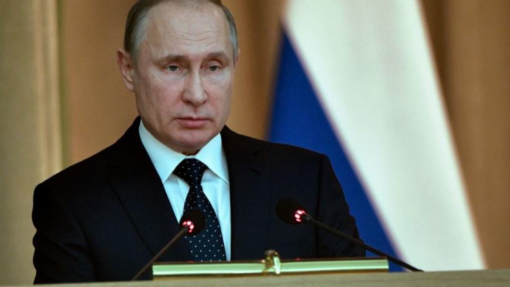 Минимална кампания  на Владимир Путин  месец преди президентския вот