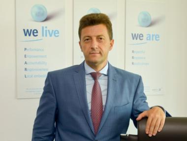 Нормално е да има още обединения на банки в България