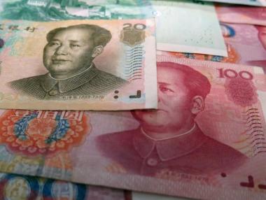 Китай дезинфекцира банкноти заради коронавируса