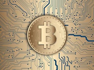 Биткойнът тръгна надолу след постигнатия исторически рекорд