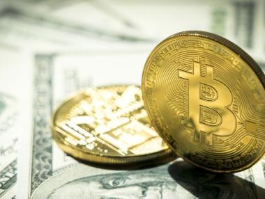 Биткойн падна под 100 000 долара